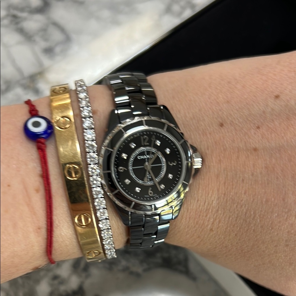 Chanel Black and Silver with diamonds women’s watch